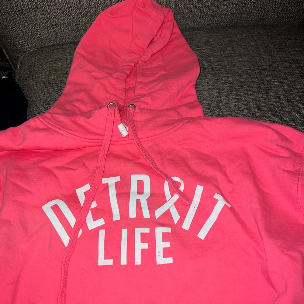 Neon pink hooded with front pocket sweatshirt
